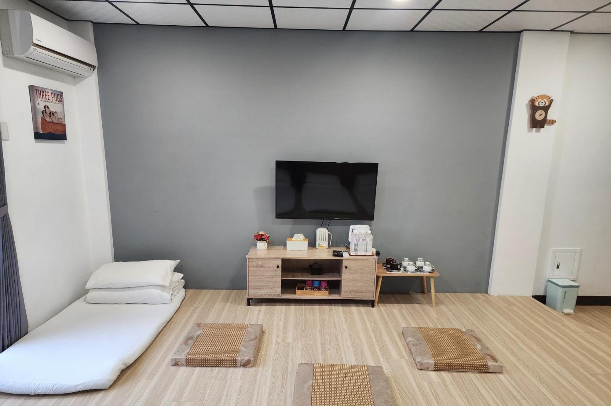 藏青民宿the Wind Guesthouse-Youth Inn ไถหนาน ห้อง รูปภาพ